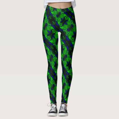 Blue dashes and shapes on a green background leggings