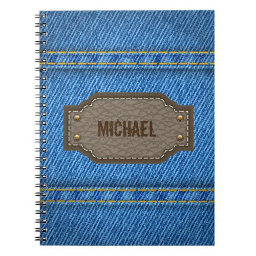 Blue denim jeans with leather name label notebook