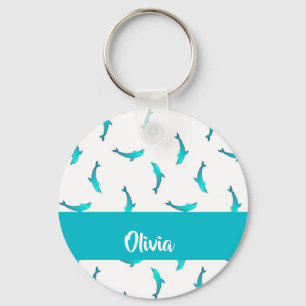 Blue dolphins on white keychain