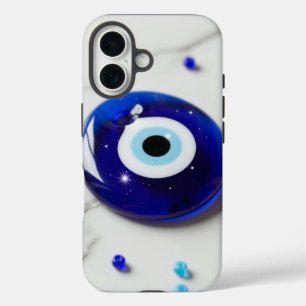 Blue Evil Eye Amulet on White Marble Surface iPhone 16 Case