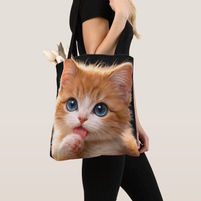 Blue-Eyed Paw licking Kitten Tote Bag (Close Up)