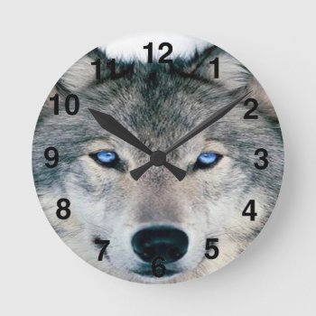 Blue Eyed Wolf Round Clock by LATENA at Zazzle