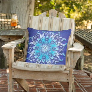 Blue floral mandala on grunge background. outdoor pillow