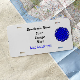 Blue Flower Ribbon by Kenneth Yoncich License Plate