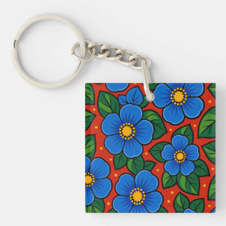 Blue Flowers and Green Leaves on a Red Background Keychain