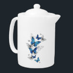 Blue Flying Butterflies Morpho Teapot<br><div class="desc">Flying Blue Butterflies morpho and white butterflies on a light abstract background. Morpho. Design with blue butterflies morpho.</div>