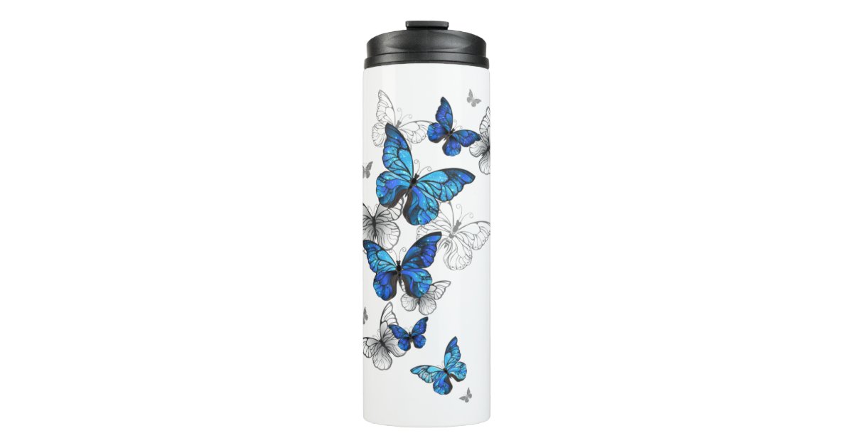 https://rlv.zcache.com/blue_flying_butterflies_morpho_thermal_tumbler-r053343056314425fa1ac1cc0b11bdc8e_60f89_630.jpg?rlvnet=1&view_padding=%5B285%2C0%2C285%2C0%5D