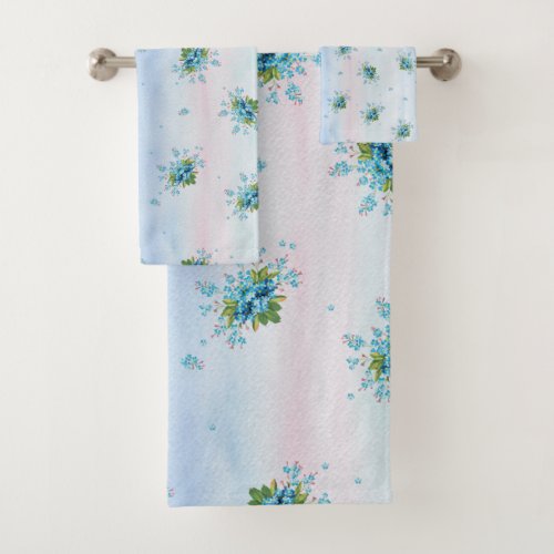 Blue forget_me_nots on a soft pink_blue bath towel set