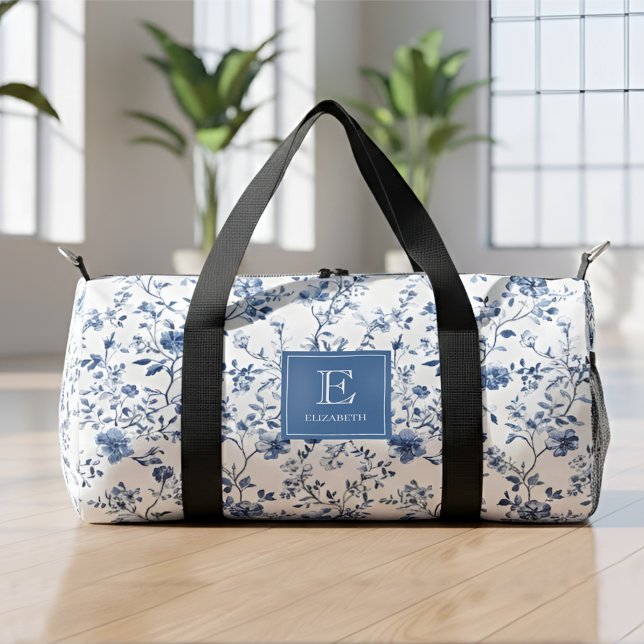 Blue French Toile Pattern Monogram Name Elegant Duffle Bag (Elegant blue french toile floral pattern with personalizable monogram name)