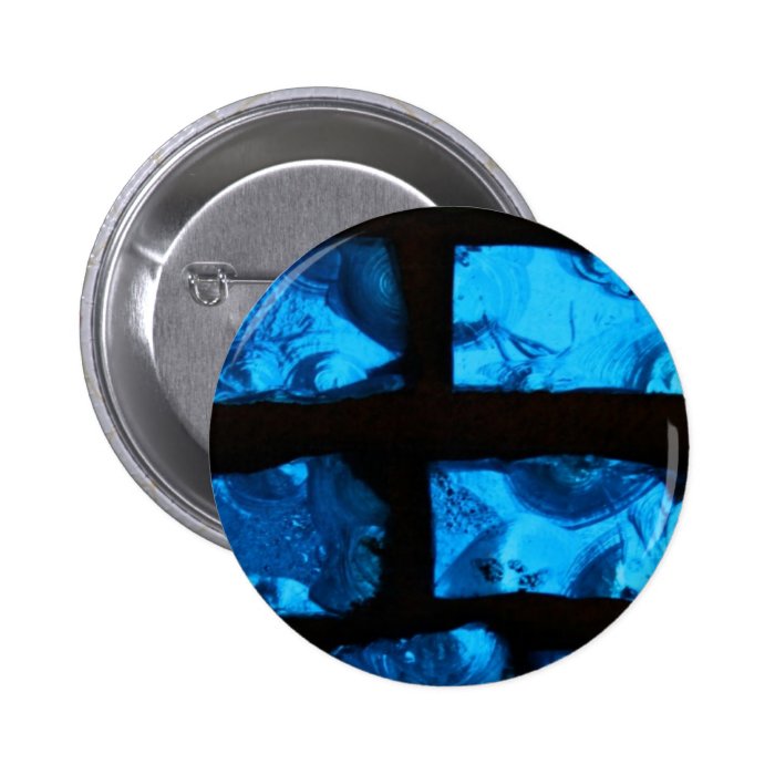 Blue glass chunks with black grout between them pins