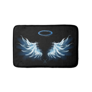 Blue Glowing Angel Wings on black background Bath Mat