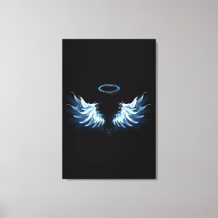 Blue Glowing Angel Wings on black background Canvas Print