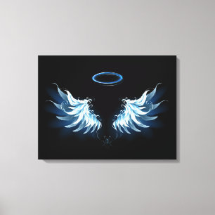Blue Glowing Angel Wings on black background Canvas Print