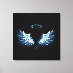 Blue Glowing Angel Wings on black background Canvas Print