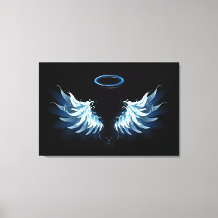 Blue Glowing Angel Wings on black background Canvas Print