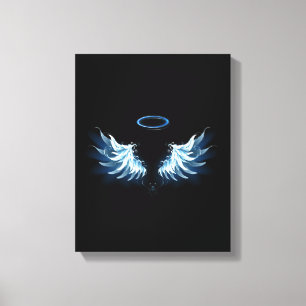 Blue Glowing Angel Wings on black background Canvas Print