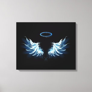 Blue Glowing Angel Wings on black background Canvas Print
