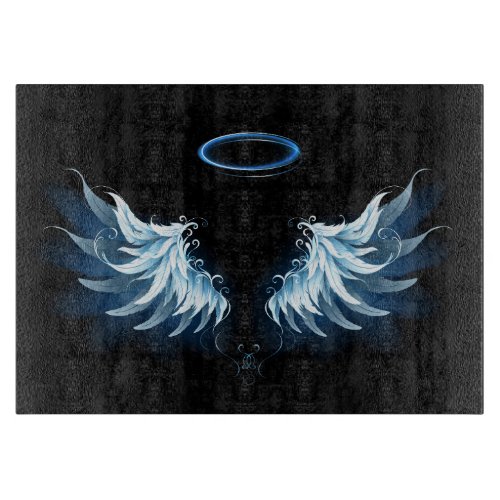 Blue Glowing Angel Wings on black background Cutting Board