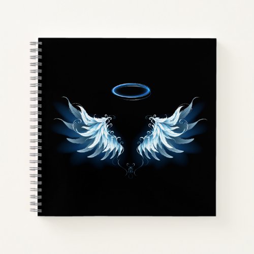 Blue Glowing Angel Wings on black background Notebook