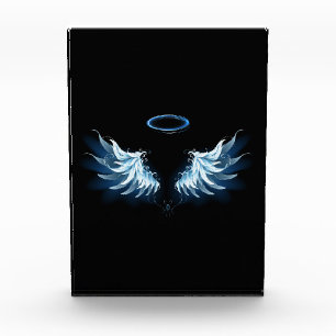Blue Glowing Angel Wings on black background Photo Block