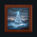 Blue Glowing Winter Night Christmas Tree Gift Box<br><div class="desc">A glowing blue Christmas tree standing peacefully in a snowy landscape. Illuminated by soft winter lights and crowned with a radiant star,  the tree shines against a dreamy night sky overlooking a quiet,  glowing town below.</div>