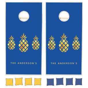 Blue gold pineapples family name cornhole set