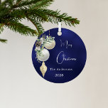 Blue gold white baubles Christmas Metal Ornament<br><div class="desc">A blue uneven colored background. Decorated with white and gold baubles and some greenery and a pine cone.  Personalize and add your name,  year.  Text: Merry Christmas</div>