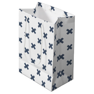 Blue-gray cross stitches on white medium gift bag
