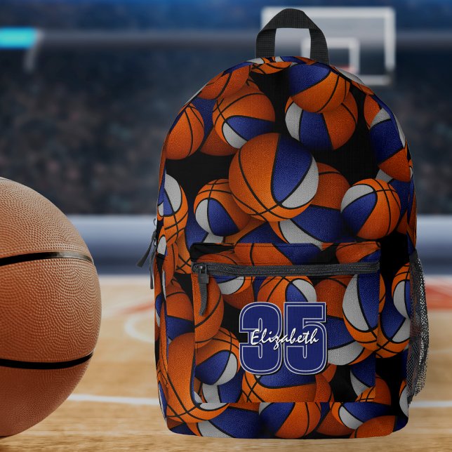 Blue gray team sports basketballs pattern printed backpack (On gymnasium floor: Basketball player's backpack w blue/gray team colors, athlete jersey number)