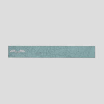 Blue-gray wings wrap around address label