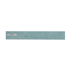 Blue-gray wings wrap around address label