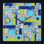 Blue Green Art Deco Stained Glass Square Wall Clock<br><div class="desc">This wall clock has an square block art deco pattern in digital stained glass. A colorful geometric design in colors of blue,  aquamarine,  and green,  perfect for a pop of color in your home decor.  You can make the pattern on this clock bigger or smaller.</div>