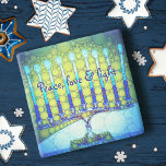 Blue Green Hanukkah Menorah Peace Love Light Bold Stone Coaster<br><div class="desc">“Peace, love & light.” A close-up photo of a bright, colorful, blue and green artsy menorah helps you usher in the holiday of Hanukkah in style. Feel the warmth and joy of the holiday season whenever you relax with your favorite beverage on this stunning, colorful Hanukkah stone coaster. Makes a...</div>
