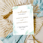 Blue Green Watercolor Folded Wedding Program<br><div class="desc">This elegant wedding ceremony program design features beautiful soft watercolor stains in blue and green hues and gold speckles. Use of hand written typography details in gold. Personalize the wording in all sides. NOTE: this programs arrive flat and require folding down the middle to assemble. The default value paper is...</div>