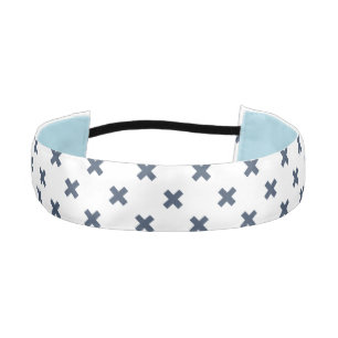 Blue-grey cross stitches on white athletic headband