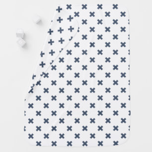 Blue-grey cross stitches on white baby blanket