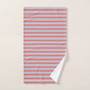 Blue-grey five stripe pattern with living coral hand towel