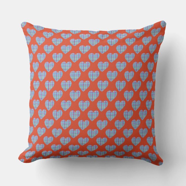Blue hearts on red throw pillow (Front)