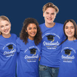 Blue High School Graduate Custom 2024 Graduation T-Shirt<br><div class="desc">This classic blue custom senior graduate t-shirt features classy white typography of your high school or college name for the class of 2024. Customize with your graduating year under the chic black handwritten script and black grad cap for a great personalized graduation tee for a party or keepsake gift for...</div>