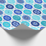 Blue Holidays Snowflakes Wrapping Paper<br><div class="desc">This snowflakes wrapping paper has a pretty blue Snowflakes holiday pattern. This pattern has three sayings “Happy Holidays”, "Let it Snow" and “Joy & Peace” in beautiful scrolling serif font. There are 11 different snowflakes with 6 colors of blue. You can make the pattern on the wrapping paper smaller or...</div>