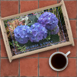 Blue Hydrangea Garden Picture Text Template Serving Tray<br><div class="desc">Pretty floral wood serving tray with hydrangea flowers and a place for your text. Purple blue hydrangea blooms are the central image in the photograph of a tropical garden. Other colorful plants and leaves in the background make this an interesting bottom image for either brown or black wood trays. A...</div>