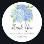 Blue Hydrangea Watercolor Floral Wedding Thank You Classic Round Sticker<br><div class="desc">These wedding thank you stickers feature blue hydrangeas and leaves. Personalize them with your names and wedding date. These stickers are ideal for use as envelope seal stickers or for decorating wedding favors. These stickers are part of a collection which includes a range of matching wedding stationery. Please visit the...</div>
