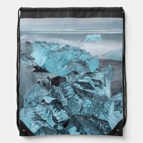Blue ice on beach seascape Iceland Drawstring Bag