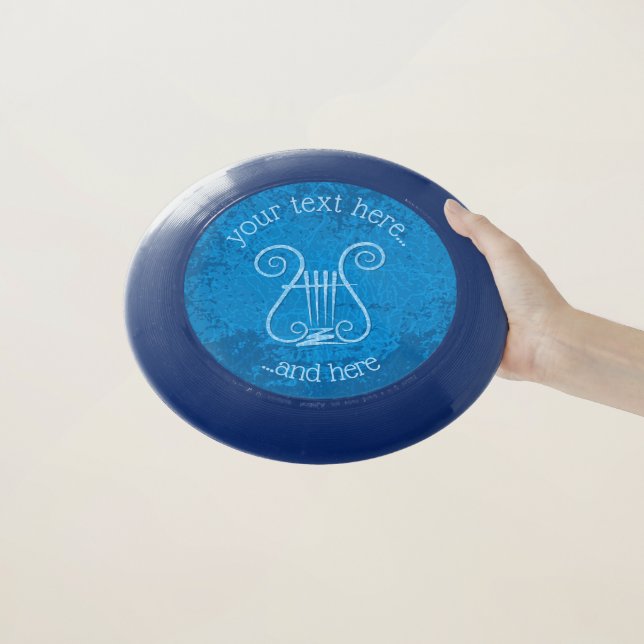 Blue Lyre Background Wham-O Frisbee (In Hand)