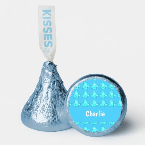 Blue melting ice cubes on blue hersheys kisses