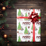 Blue Merle Aussie Dog, Bird and Christmas Tree Wrapping Paper<br><div class="desc">The repeated pattern on this cute Christmas wrapping paper is an image of a Blue Merle Australian Shepherd Dog wearing a red and white Santa hat. The dog sits among brightly wrapped gift packages beside a decorated Christmas tree. A bullfinch bird is landing on the tree behind it. Stylized red...</div>