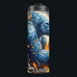 Blue Moon Gorilla Spirit Thermal Tumbler<br><div class="desc">his stylized, fantasy illustration features a majestic blue gorilla figure intertwined with flowing, decorative elements in shades of blue, orange, and cream. The gorilla appears powerful and mystical, with a soft, glowing light emanating from behind, suggesting a moonlit or ethereal setting. The overall style is intricate and artistic, blending animal...</div>