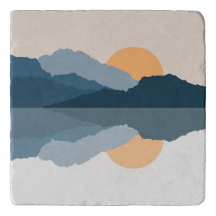 Blue mountains reflected in the lake trivet