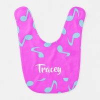Blue musical notes on pink baby bib