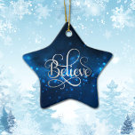 Blue Night Sky Believe Christmas Ceramic Ornament<br><div class="desc">This dramatic and elegant ornament features silver script that says "Believe" against a blue night sky with glowing blue stars. The back of the ornament has the same night sky background,  with your custom silver text at the center.</div>